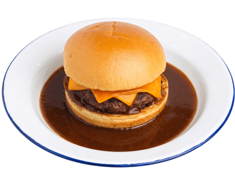 Hambúrguer alto servido em prato fundo de borda azul, coberto por molho demi-glace escuro e brilhante